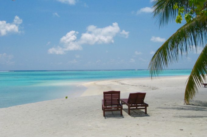 Maldives beach with chairs